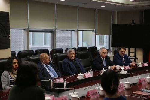 The delegation at a meeting in Beijing