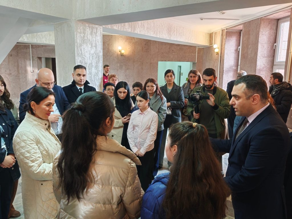 Meeting staff, teachers and pupils in the hall