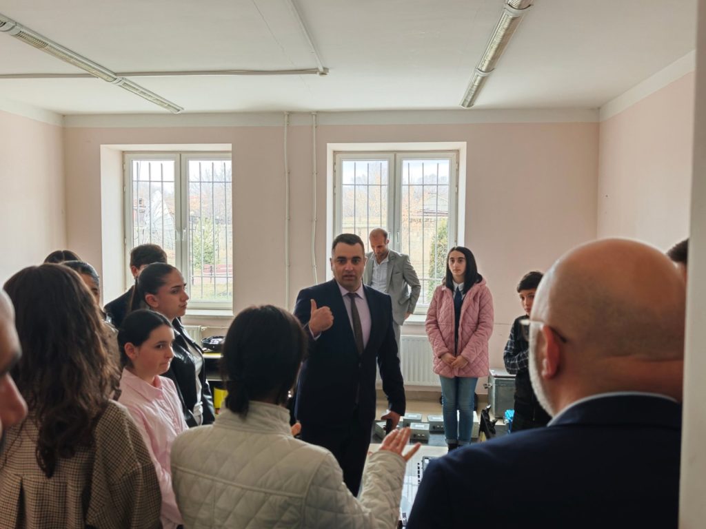 Director Jon Karapetyan shows Minister Zhanna Andreasyan historical instruments in the Nazarov memorial room